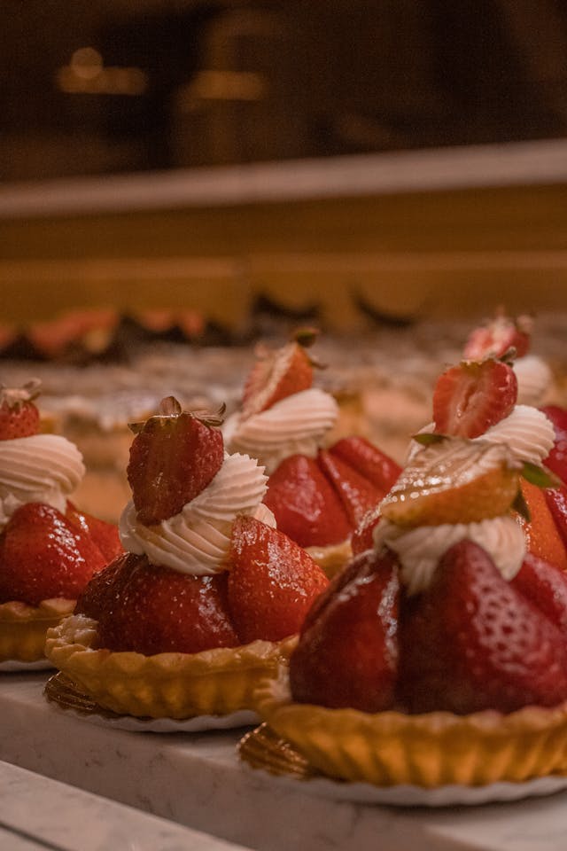 a portrait photo of dessert tarts